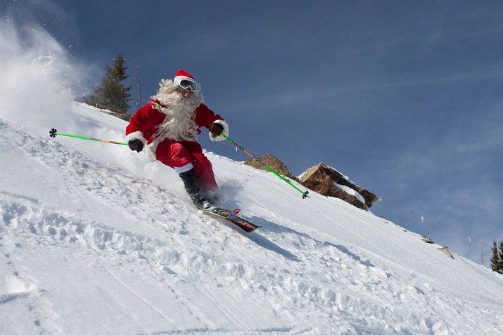 10 Ways to Spend Your Holiday in Aspen - Santa skiing at The Little Nell